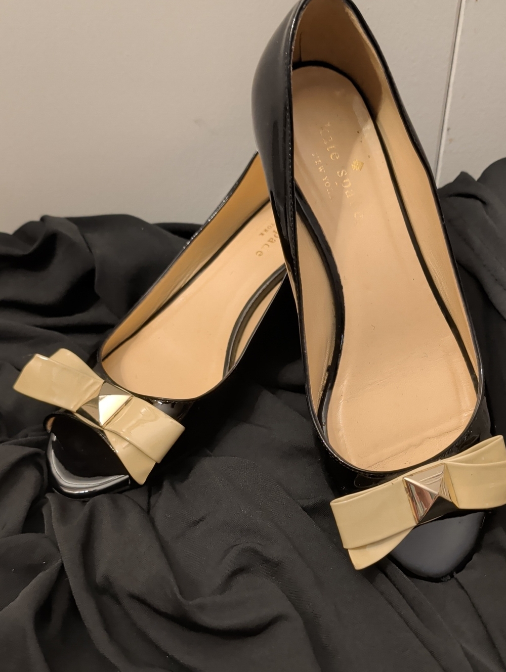 kate spade Black Patent Peep-Toe Heels with Cream Bow Accent